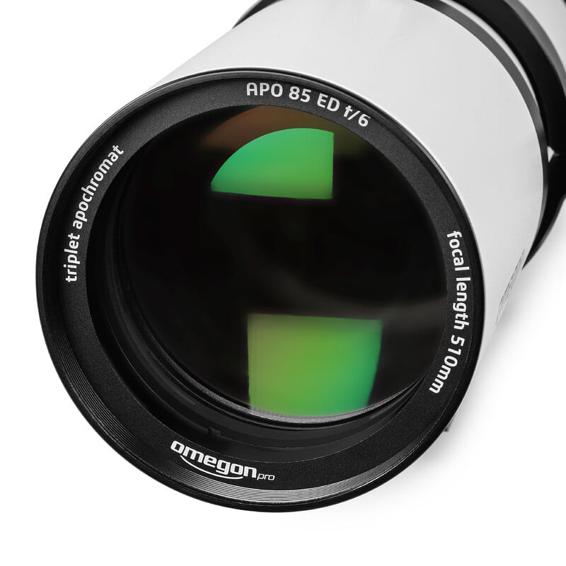 Omegon Pro 85/510 Apochromatic Refractor Triplet ED FCD-100 2 Omegon Apochromatic Refractor Pro APO AP 85 510 Triplet ED FCD 100 Omegon Refractor Pro APO AP 85/510 close-up of multicoated front lens labeled APO 85 ED f/6 triplet apochromat