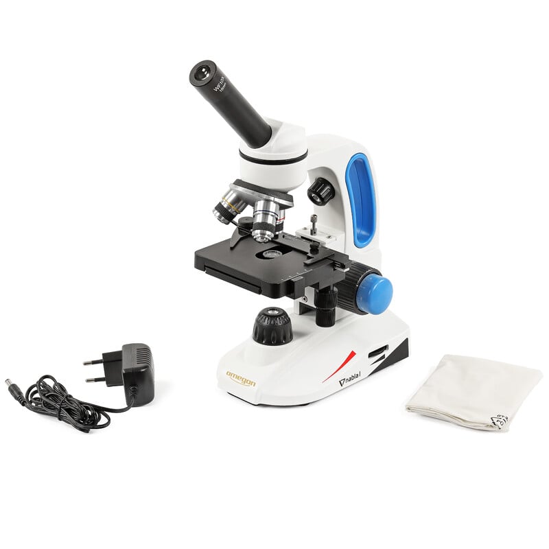 Omegon Microscoop Nabla I Mono 2 Omegon Microscoop Nabla I Mono Omegon Microscoop Nabla I schuin zijaanzicht inclusief stroomadapter, LED-lamp, en accessoireset ernaast