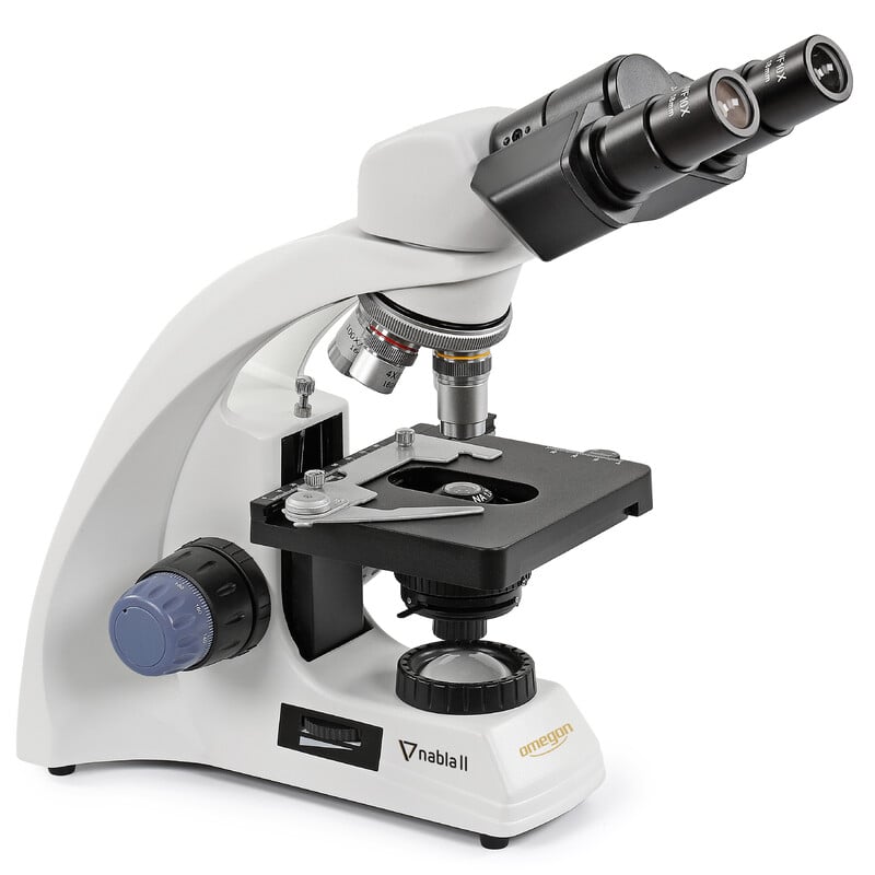 Omegon Microscope Nabla II Bino 1 Omegon Microscope Nabla II Bino 2 Microscope Nabla II oblique front view with cross-table, Abbe condenser and objective revolver.